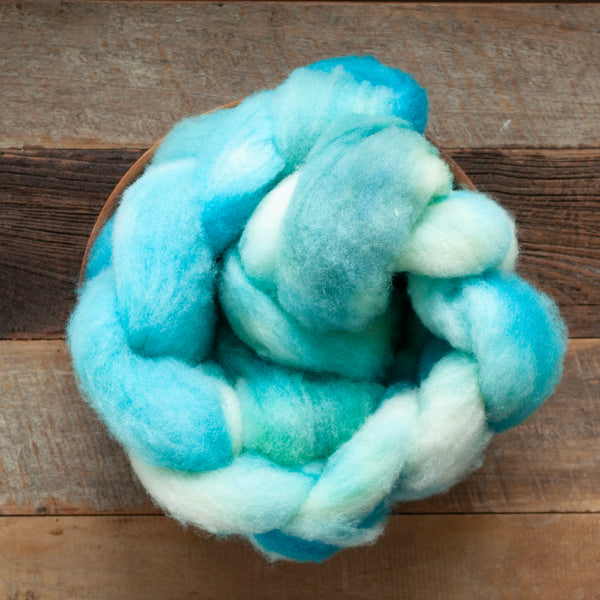 Handdyed Canadian Rambouillet x Corriedale lambswool roving, sold in 100 gram bumps